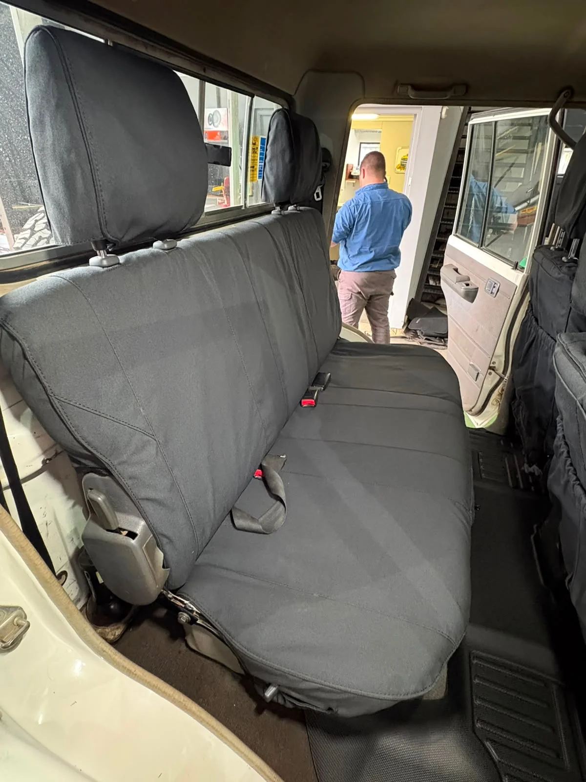 Rear bench with fitted Tougher seat cover